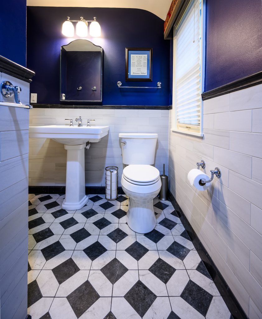 Remodeled bathroom with subway tile wall treatment